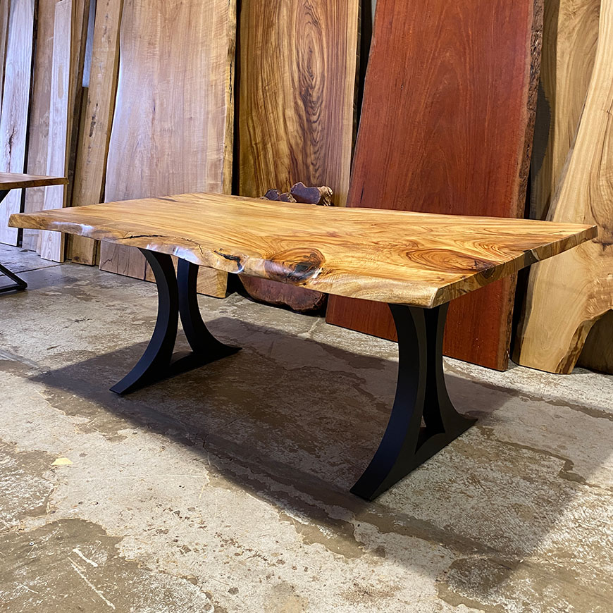 ARCO single slab dining table in Camphor Laurel